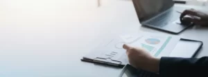 a business finance man is reviewing a company s fi 2023 11 27 05 34 02 utc