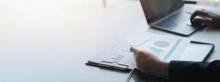 a business finance man is reviewing a company s fi 2023 11 27 05 34 02 utc